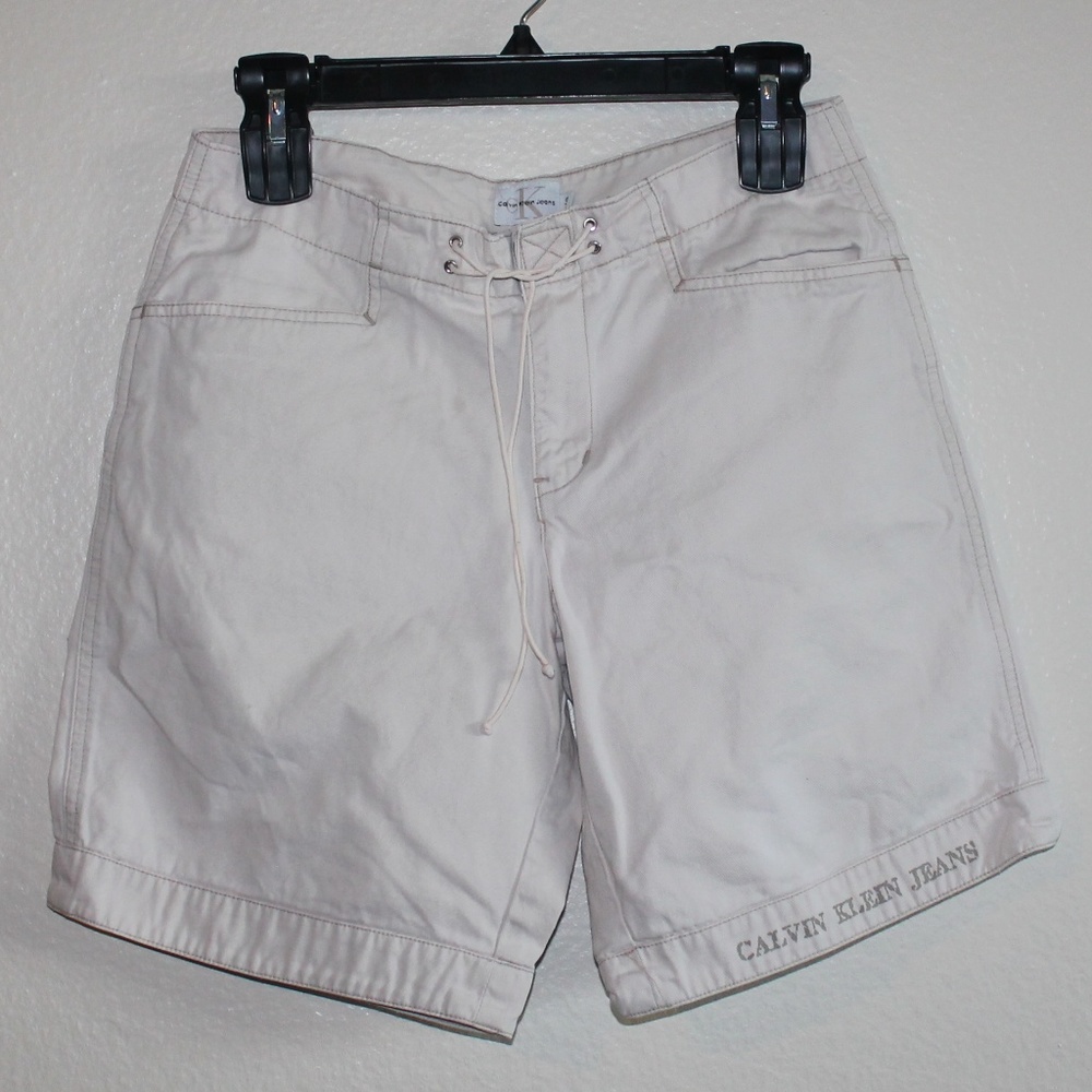 ‘Calvin Klein Jeans’ cream/ tan colored short